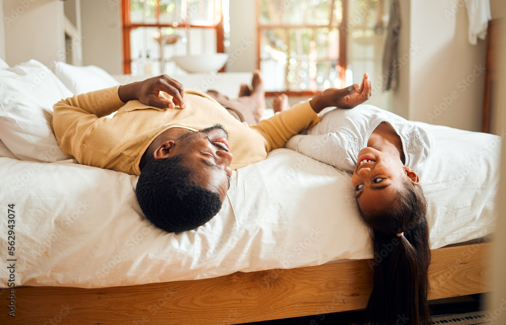 Black family, children and bed with a father and daughter bonding together while lying in a bedroom 