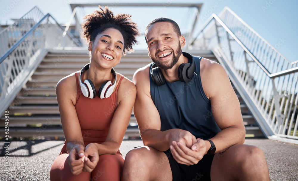 Sports, love and couple on stairs in city on break from exercise workout with smile and headphones. 