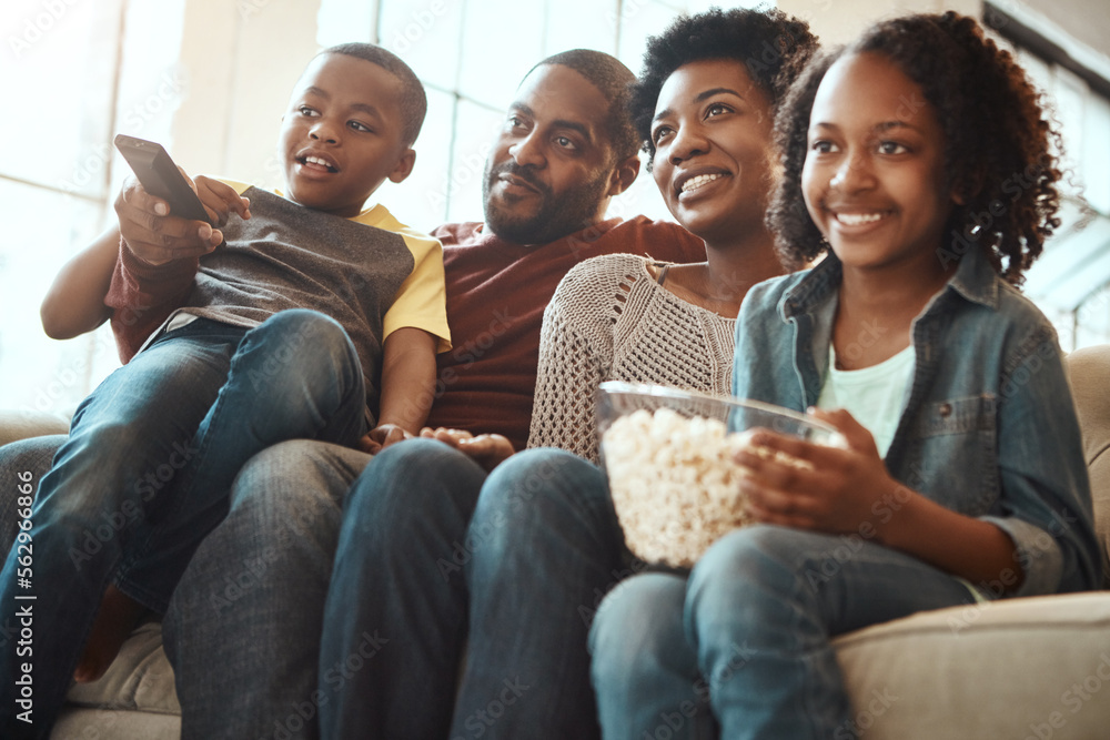 Black family watching tv on sofa for movie, film and cartoon together, bonding and quality time in l