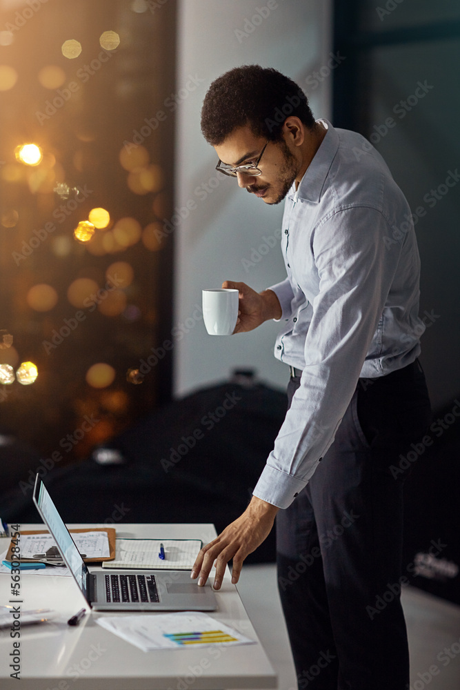 Laptop, night coffee and businessman reading feedback review of financial portfolio, stock market or