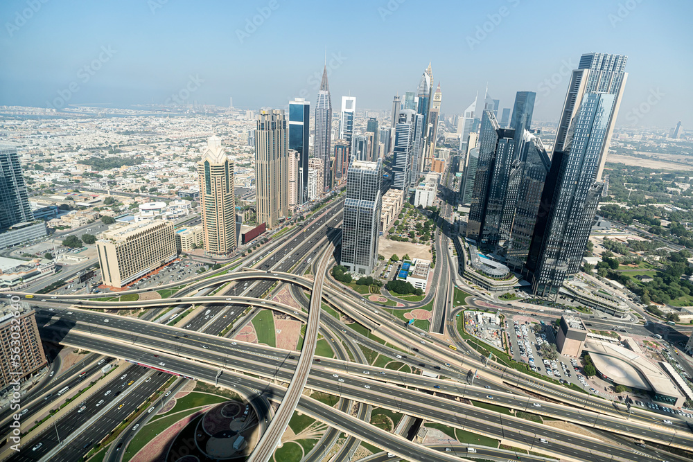 wide avenue among the skyscrapers of Dubai top view.