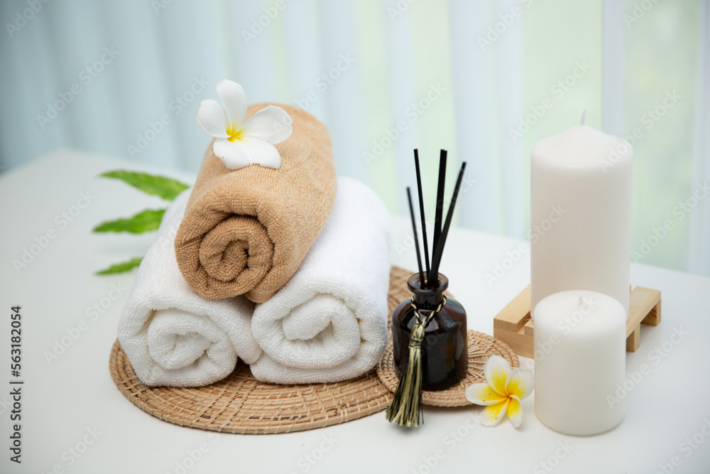 Spa accessory composition set in day spa hotel , beauty wellness center . Spa product are placed in 