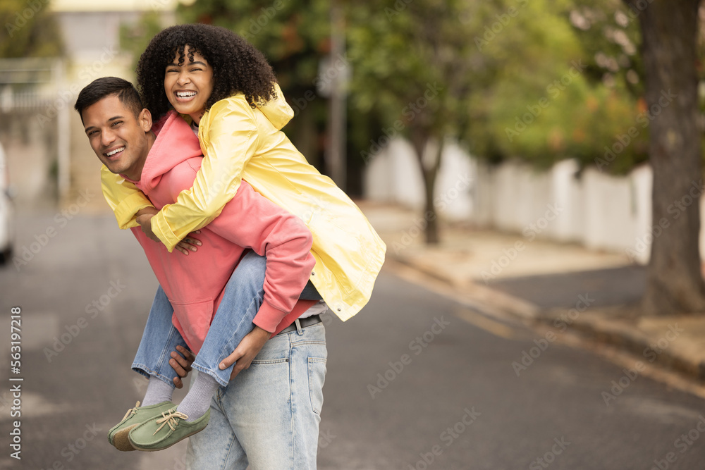 Black couple, piggyback and portrait of young people with love, care and bonding in a street. Urban,