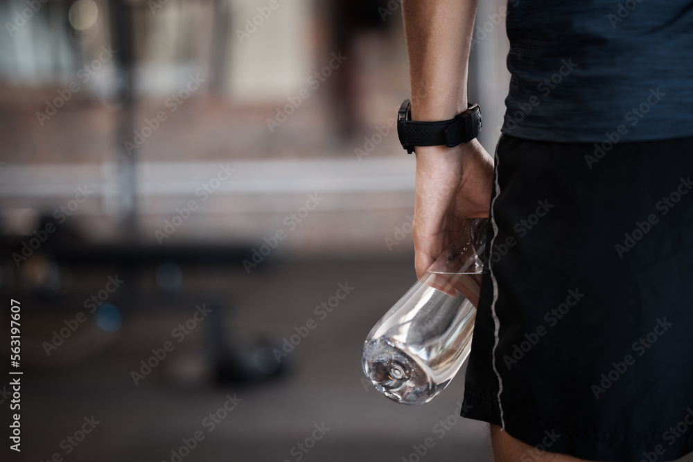 Water bottle, fitness and gym sports of a man at a wellness, training and exercise club with mockup.