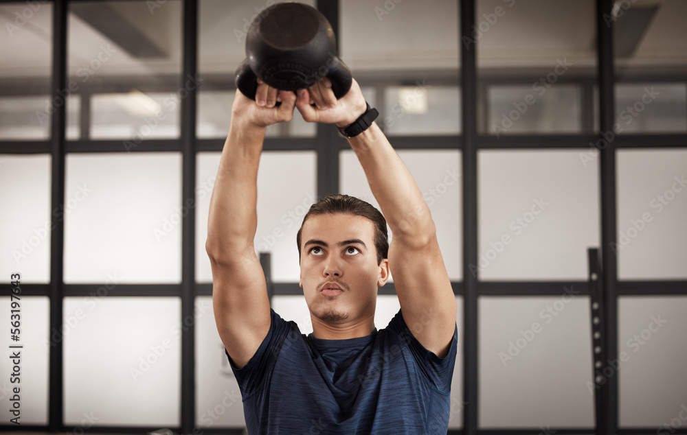 Man, kettlebell and gym fitness of a person training with focus mindset in a health studio. Power tr