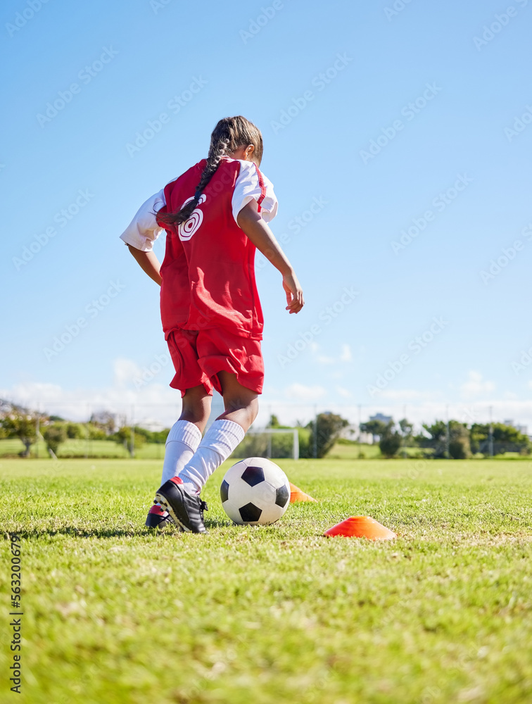 Sports, training and girl playing soccer for fitness, physical activity and hobby on a field in Spai