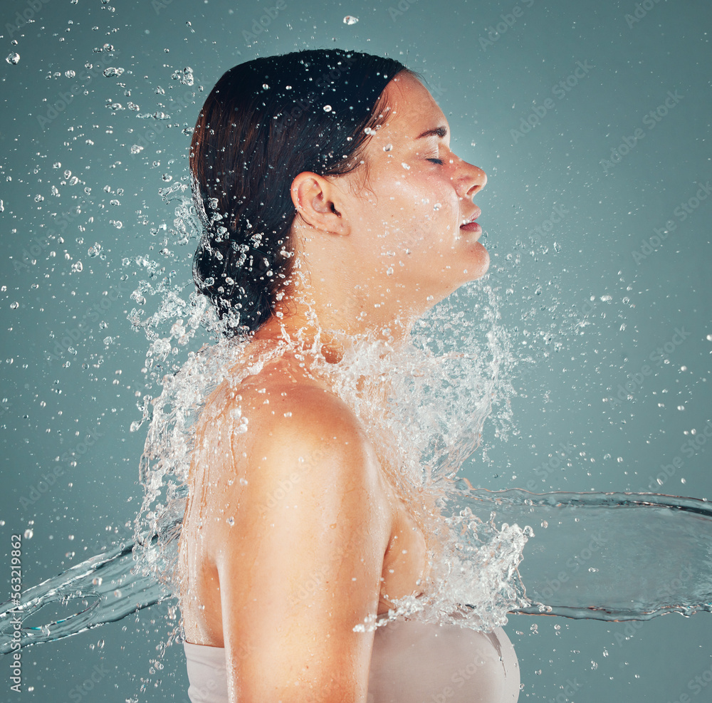 Shower, wellness and water splash on woman for skincare hygiene and hydration isolated in a studio b