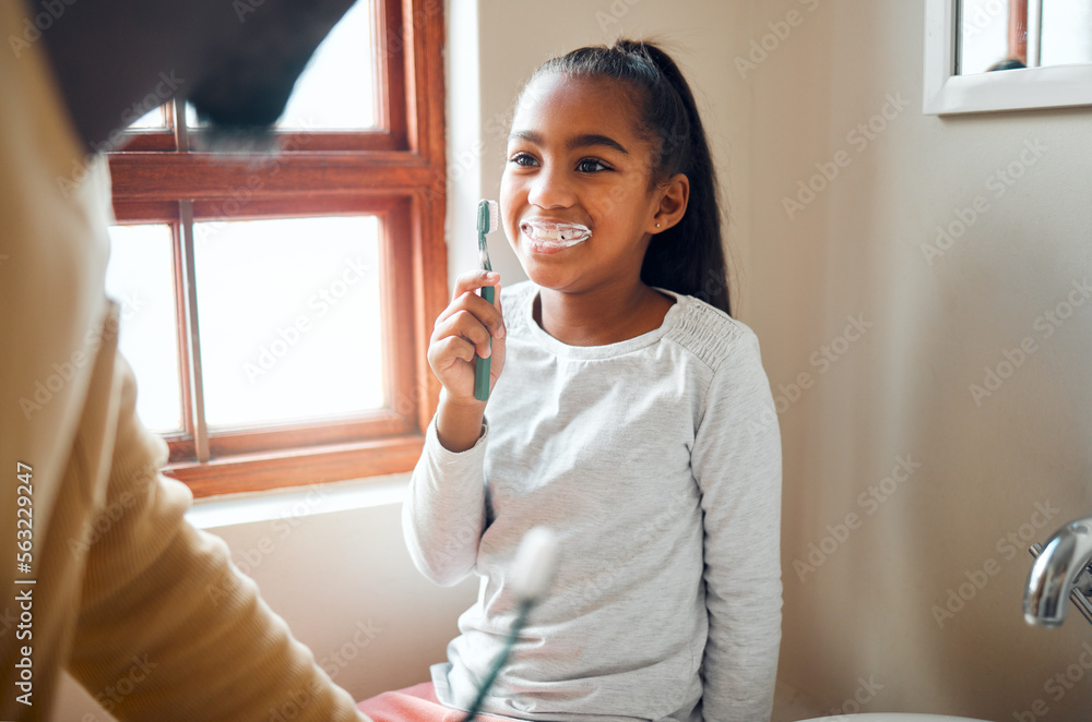 Daughter, father and brushing teeth in a bathroom for hygiene, grooming and bonding. Oral care, girl