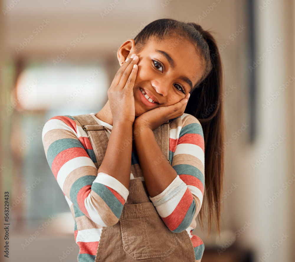 Little girl, portrait smile and hands on face looking cute, adorable or innocent at home. Happy fema