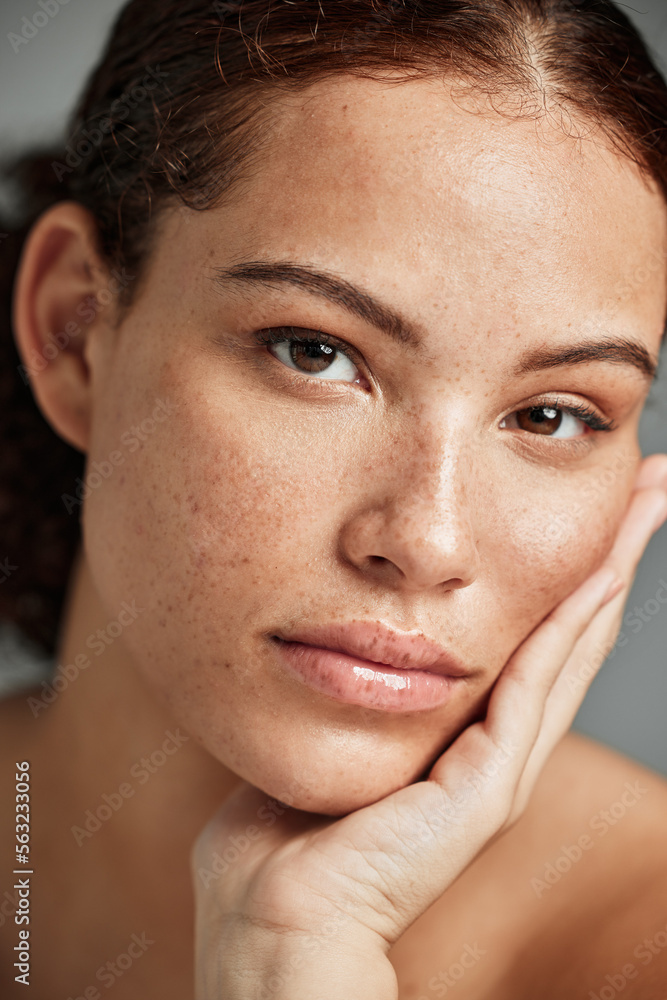 Portrait, beauty skincare and face of woman in studio isolated on gray background. Makeup, natural c