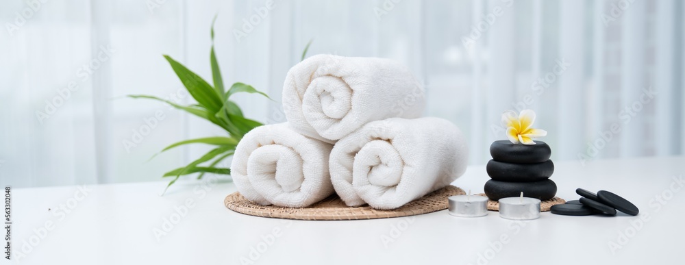 Spa accessory composition set in day spa hotel , beauty wellness center . Spa product are placed in 