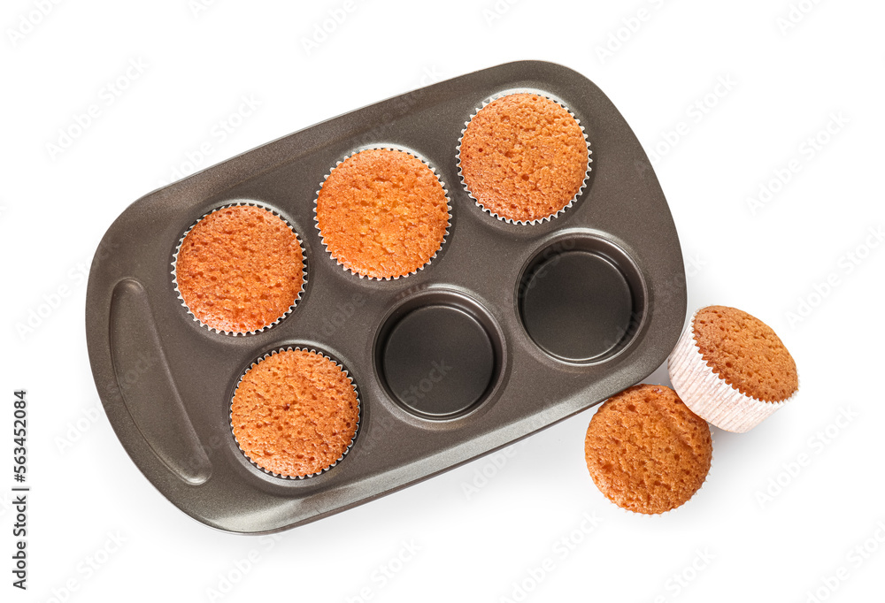 Baking tray with tasty muffins on white background