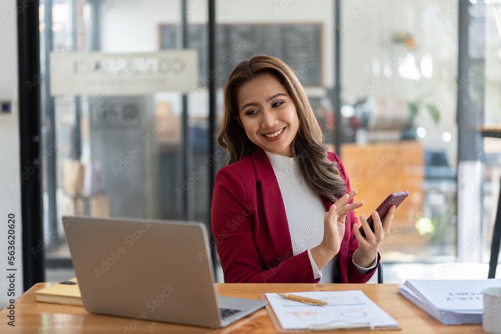 Young woman working with a laptop. Female freelancer connecting to internet via computer. Businesswo