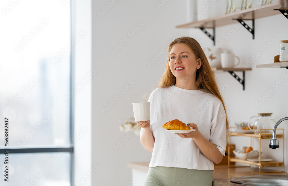 young woman enjoying a cup of coffee