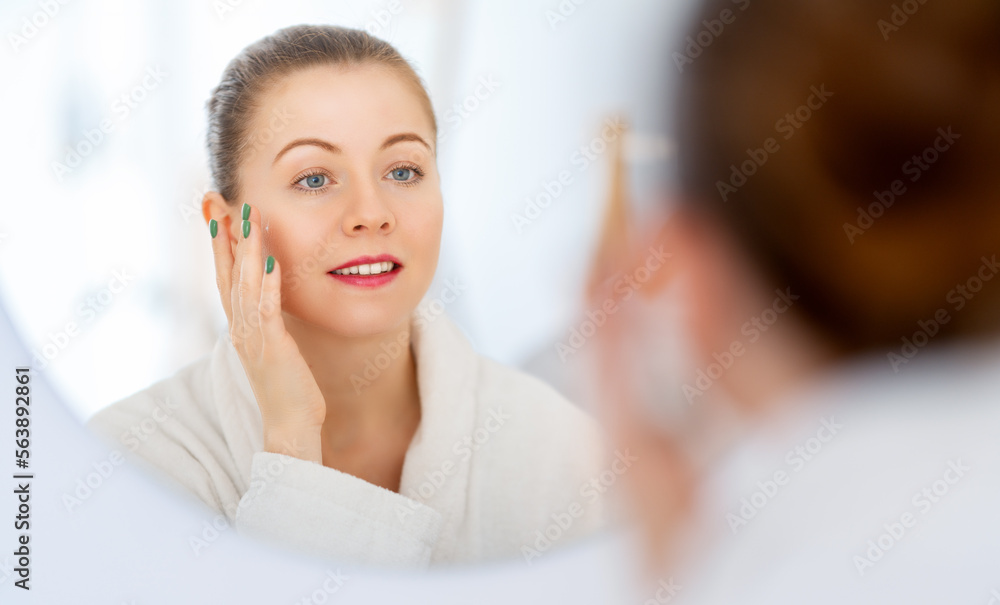 woman with cream for her face