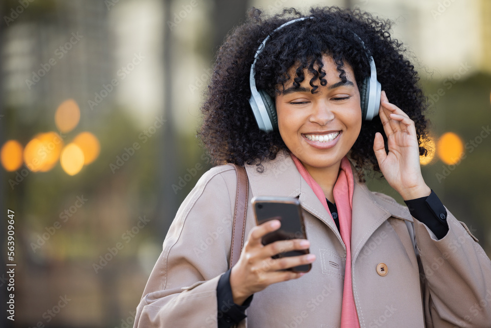 Black woman, texting and phone in city with headphones, smile and social media chat. Gen z businessw