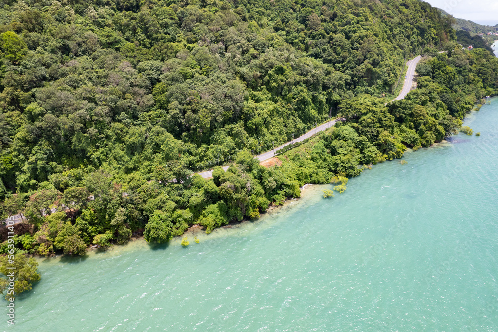 Aerial view of curve road along the seashore at Phuket Thailand beautiful seacoast and open sea in s