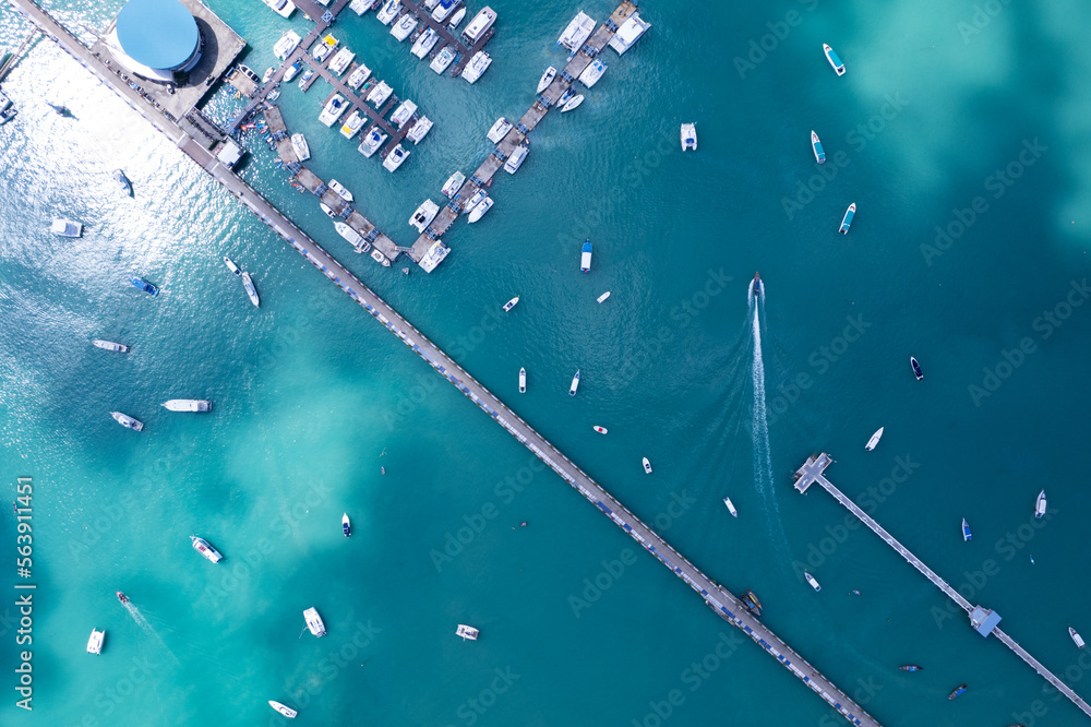 Aerial View Top down Drone shot of Yacht and sailboat parking in marina Transportation and travel ba