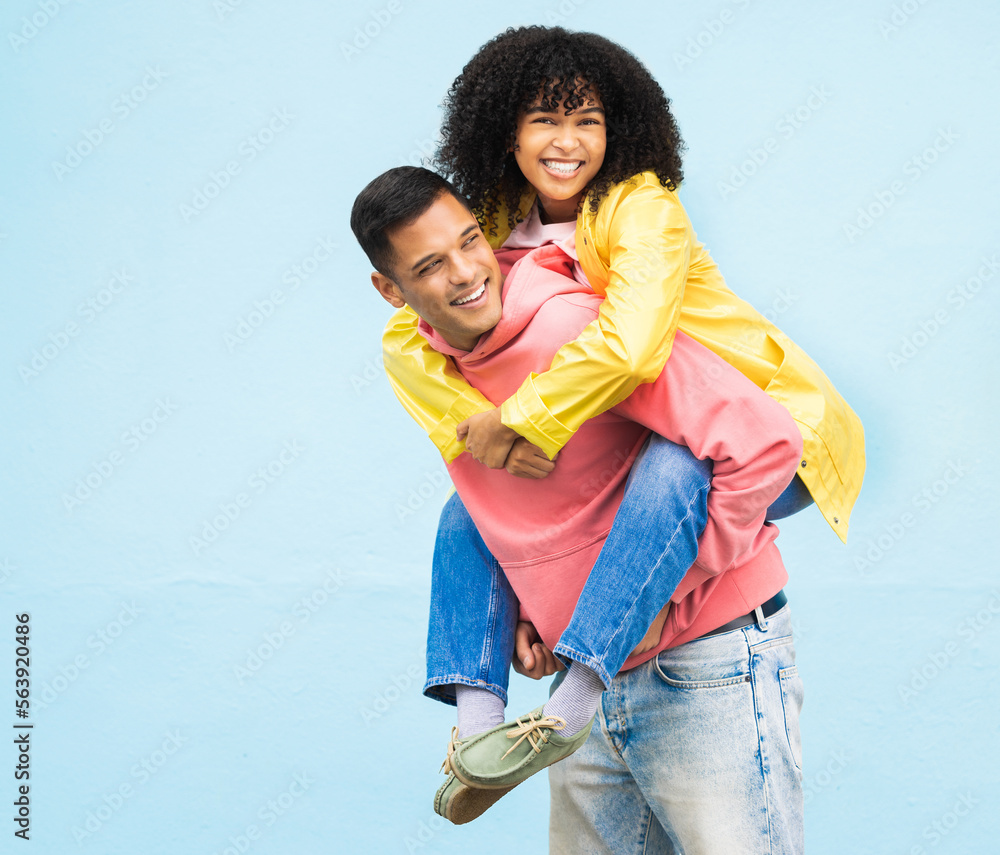 Happy couple, bonding or piggyback on isolated blue background in city travel, date or fun game. Smi