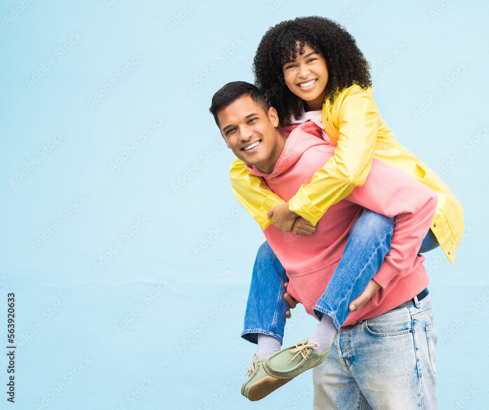 Happy couple, bonding or piggyback portrait on isolated blue background in city travel, date or fun 