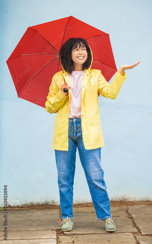 Rain, black woman and umbrella in a city for travel, having fun and solo trip on wall background. We