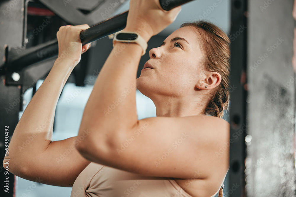 Fitness, pull up and woman at gym for training, health and cardio, focus and power mindset. Exercise