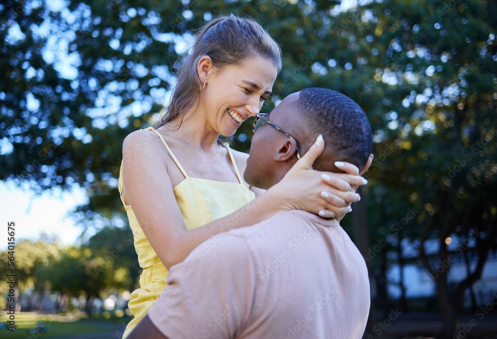 Love, park and laugh with an interracial couple bonding outdoor together on a romantic date in natur