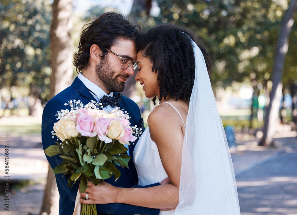 Married couple, flower bokeh and smile for wedding, marriage or loving commitment together in the pa