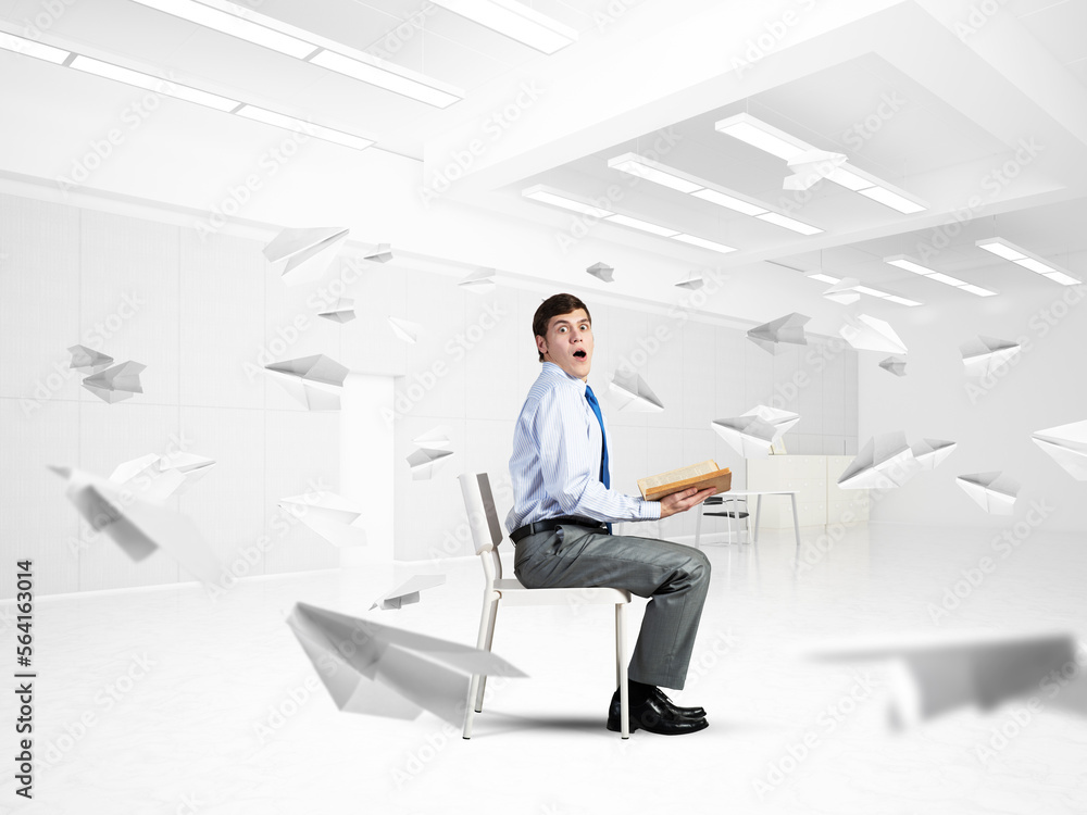 young businessman with book