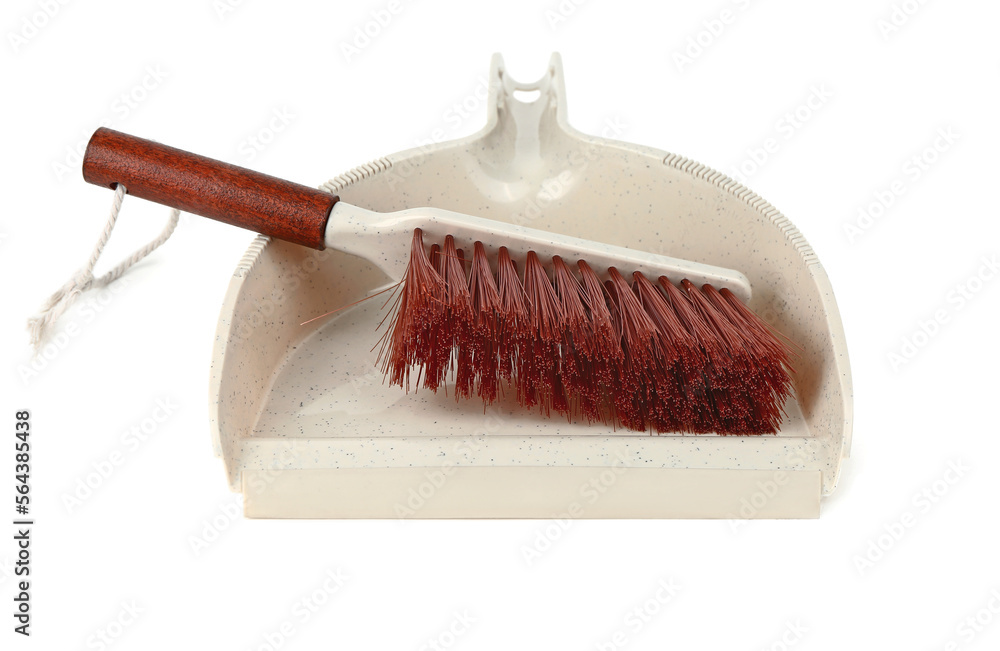 Dustpan and brush on white background