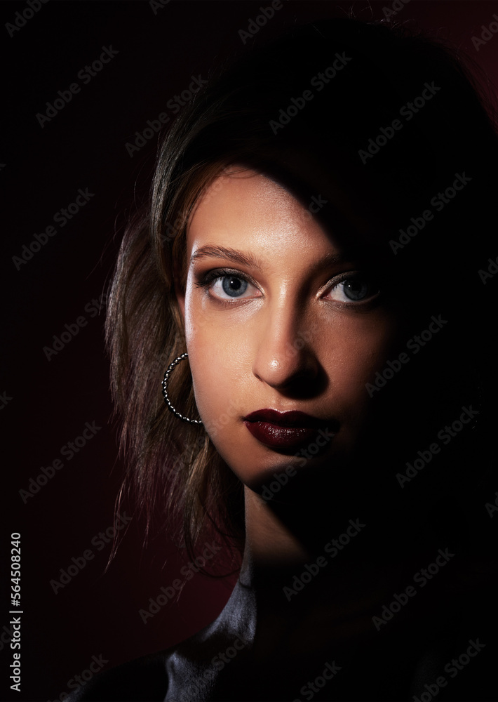 Portrait, beauty and makeup with a model woman in studio on a dark background for fashion or cosmeti