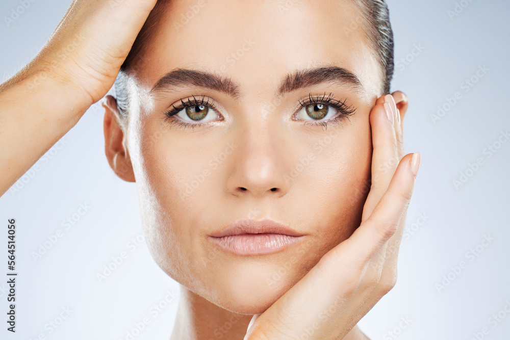 Beauty, skincare and portrait of a woman with makeup isolated on a grey studio background. Glow, cle