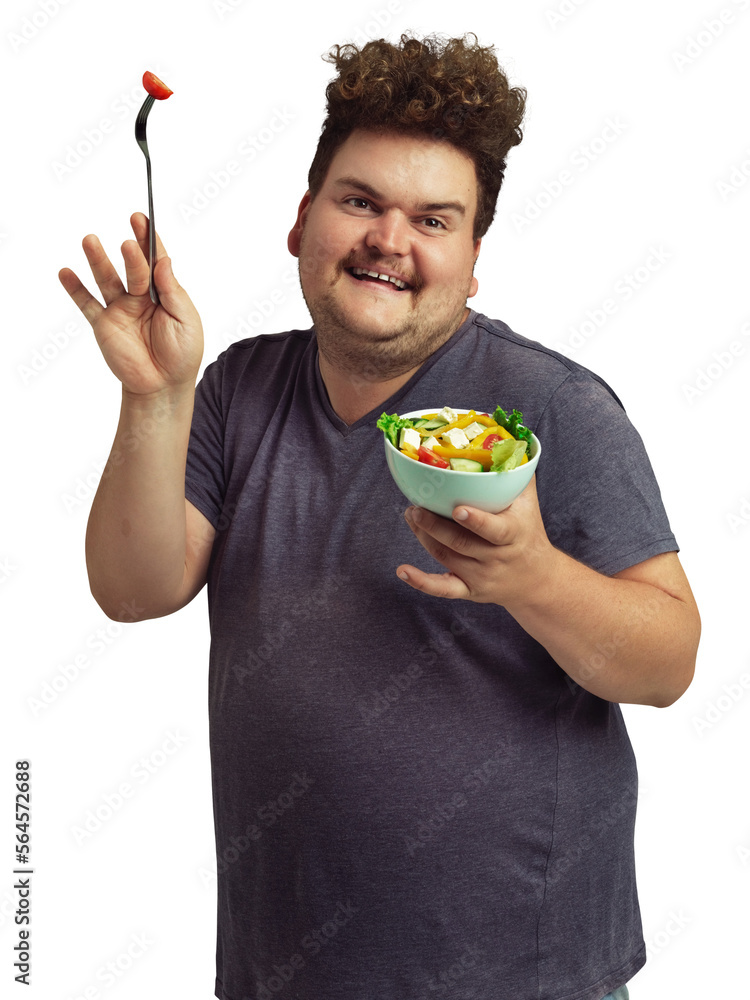 An overweight man holding a bowl of salad in a silly pose isolated on a PNG background.