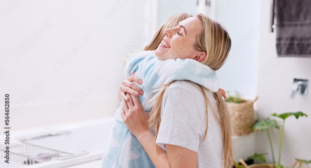 Girl, mother and bathrobe in a bathroom for cleaning, wellness and hygiene in their home together. C