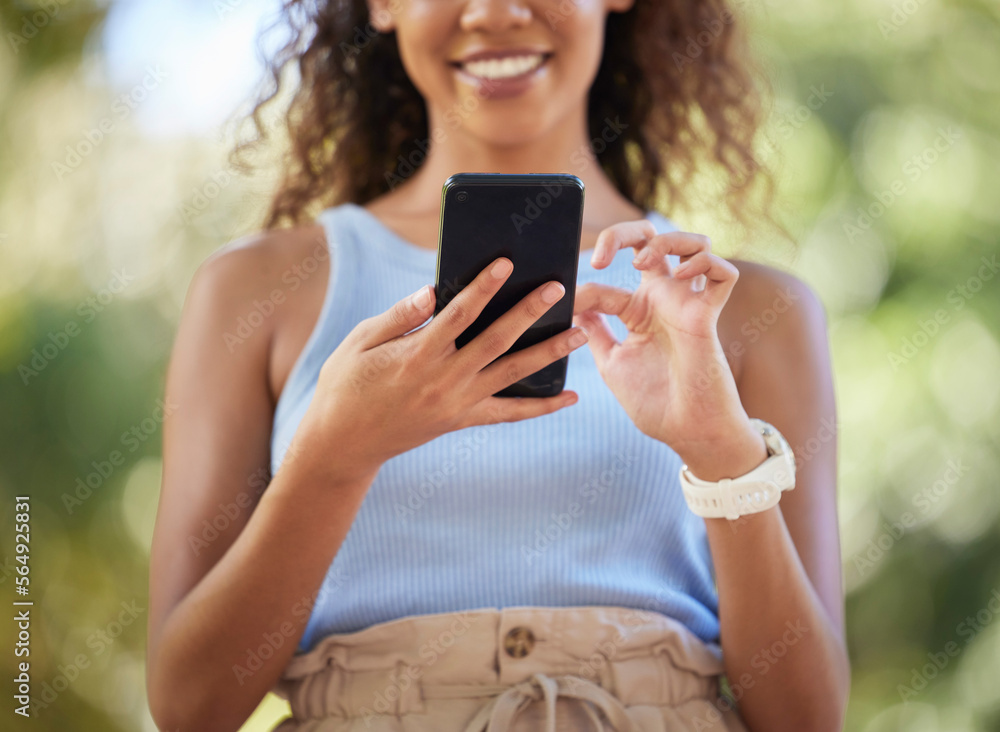 Phone, social media and woman online texting on the internet, web or app outdoors in a park. Closeup