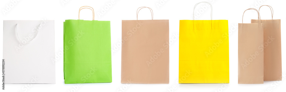 Set of paper shopping bags on white background