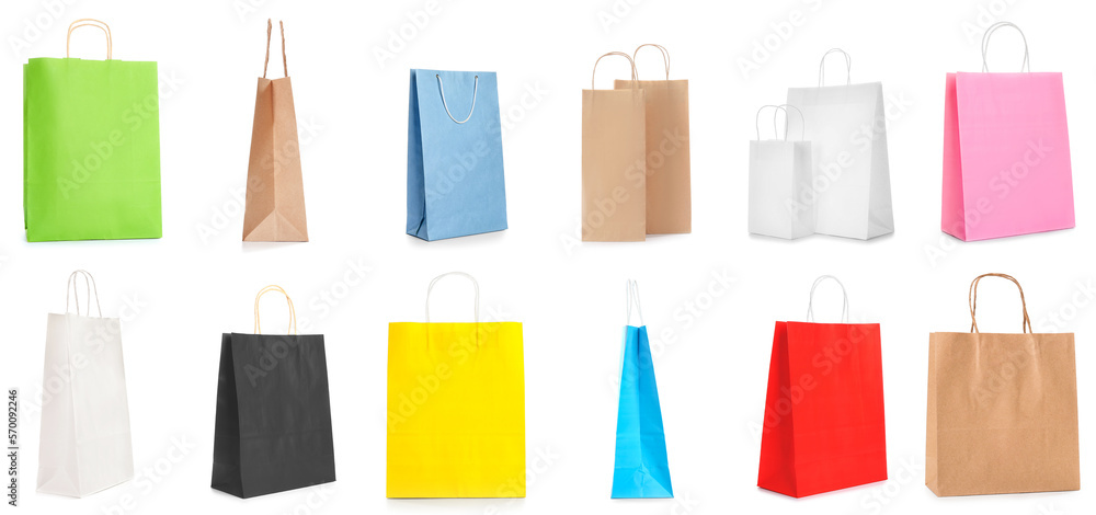 Collection of paper shopping bags on white background