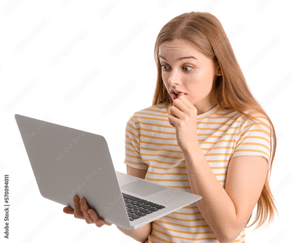 Young woman with laptop biting nails on white background