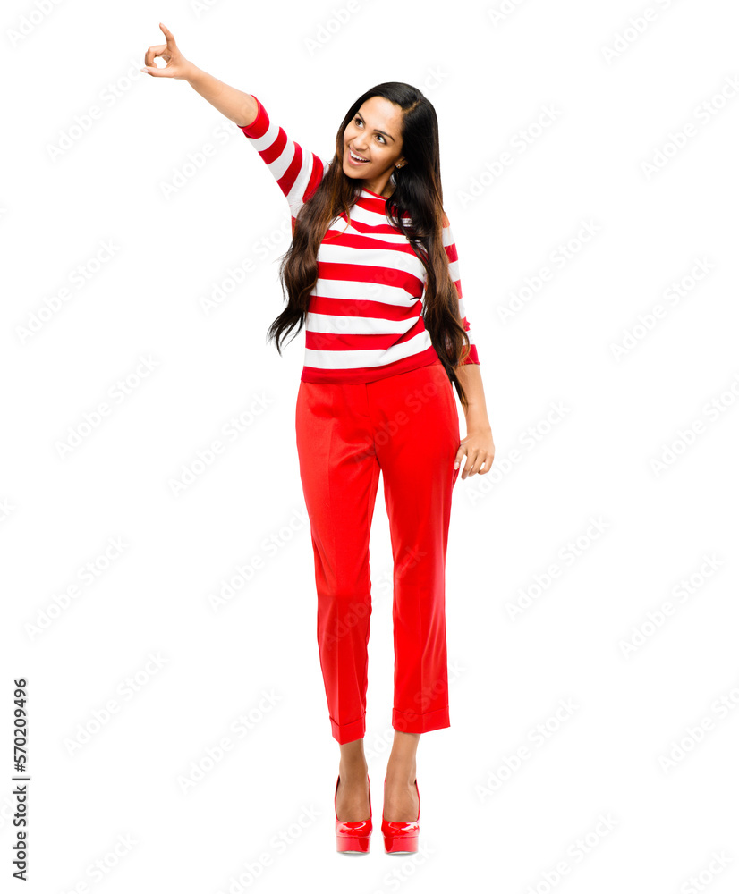 A joyous beautiful young girlfriend in a red strapped T shirt pointing at a copy space with a sign o