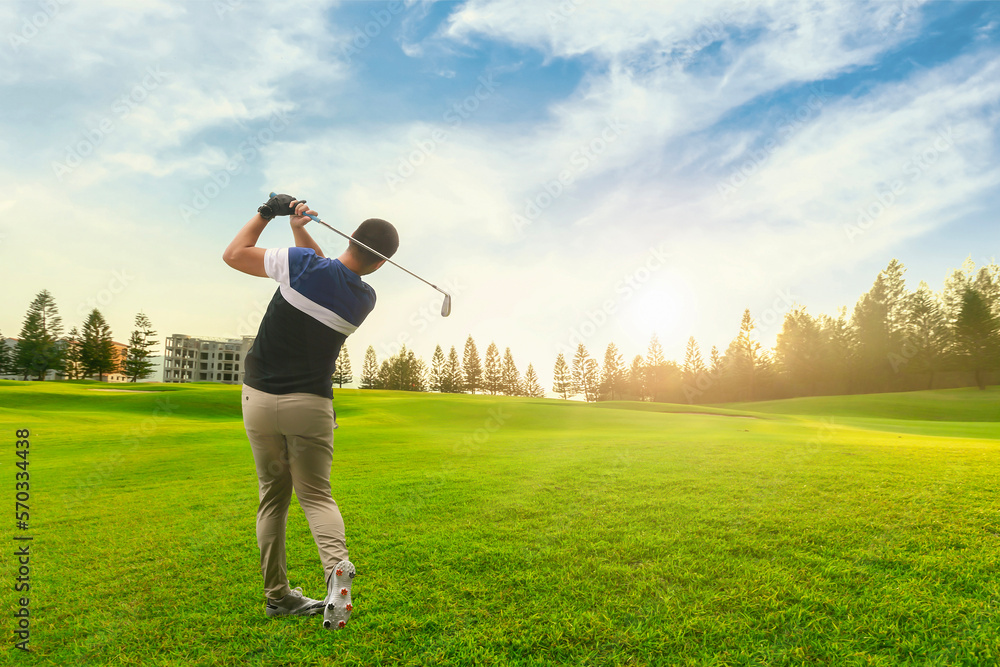 Male golf player on professional golf course.