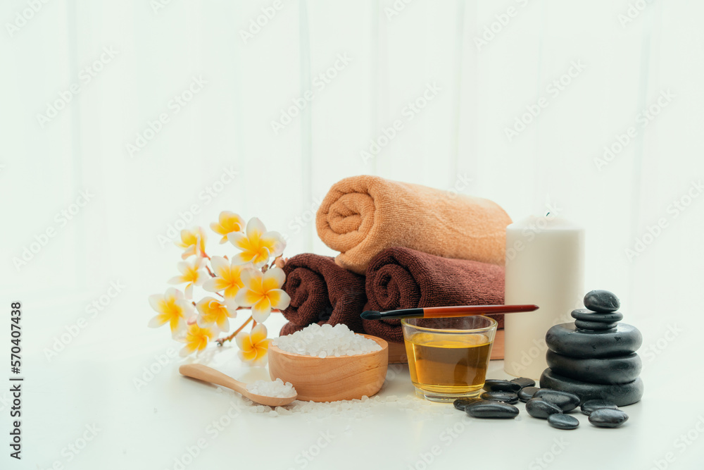 Spa accessory composition set in day spa hotel , beauty wellness center . Spa product are placed in 