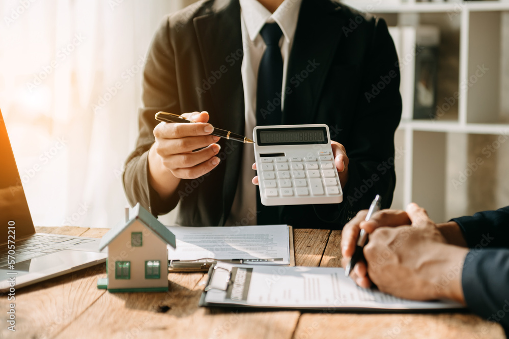 Real estate broker agent presenting and consult to customer to decision making sign insurance form a