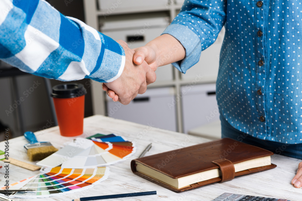 Closeup of male and female hands handshaking