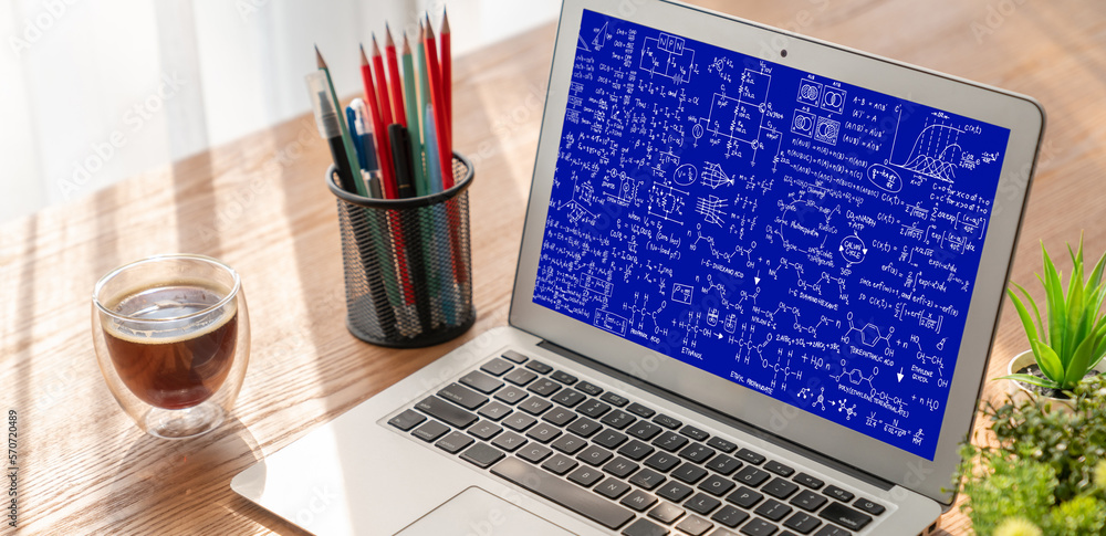 Mathematic equations and modish formula on computer screen showing concept of science and education