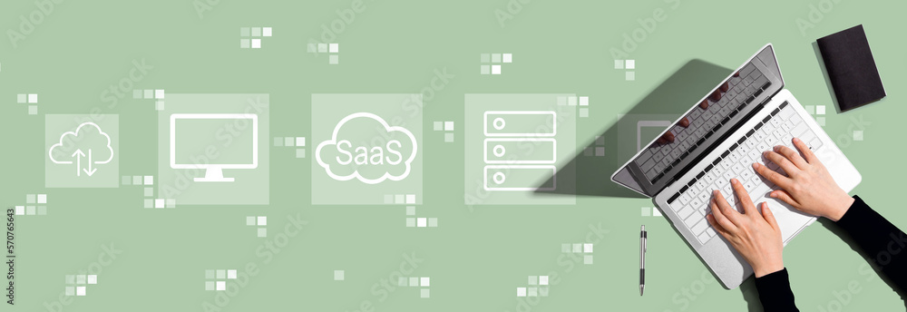 SaaS - software as a service concept with person using a laptop computer