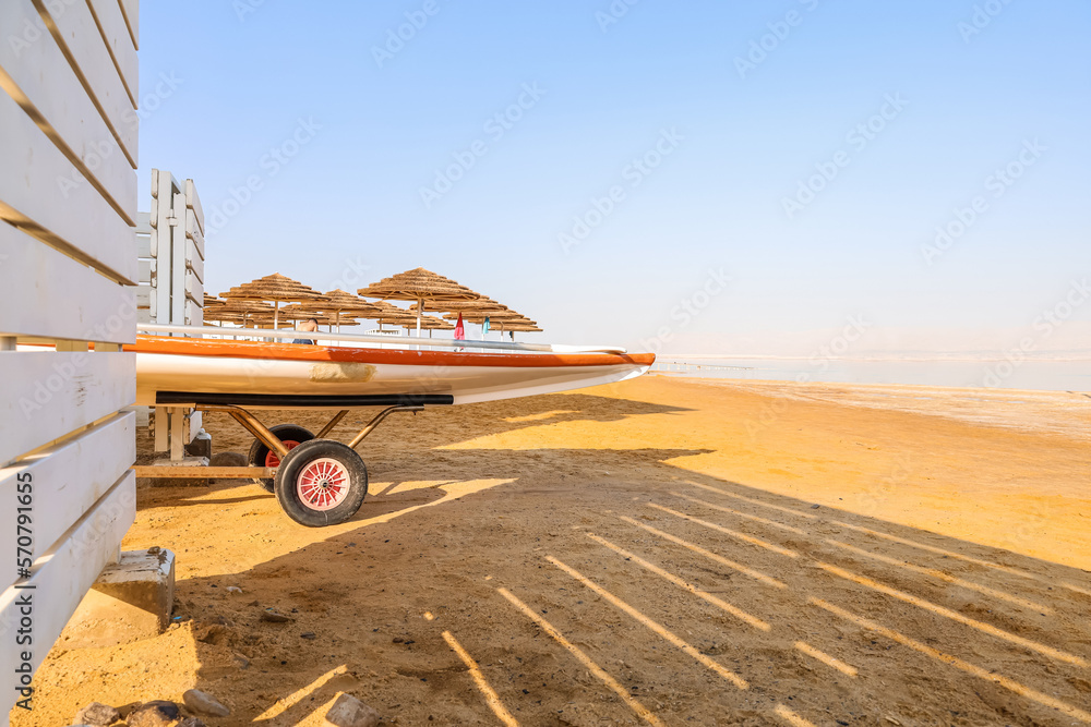 Paddle board on sea beach