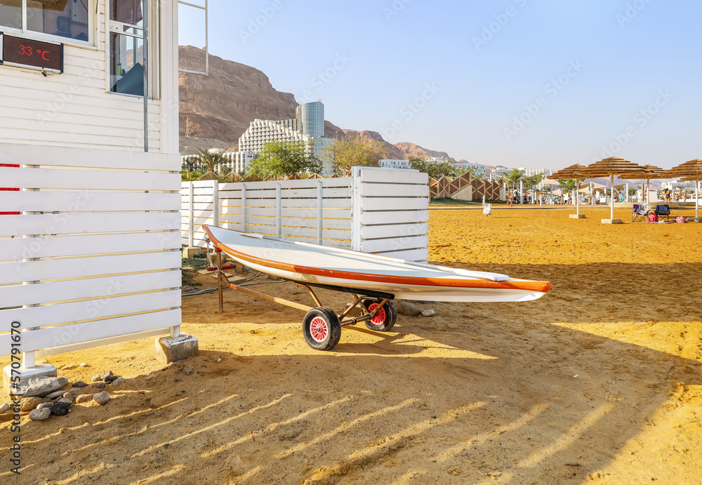 Paddle board on sea beach