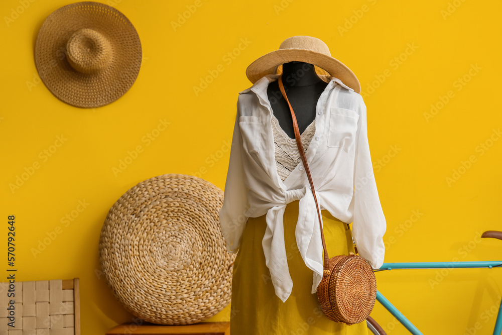 Mannequin with summer clothes in fashion designers studio