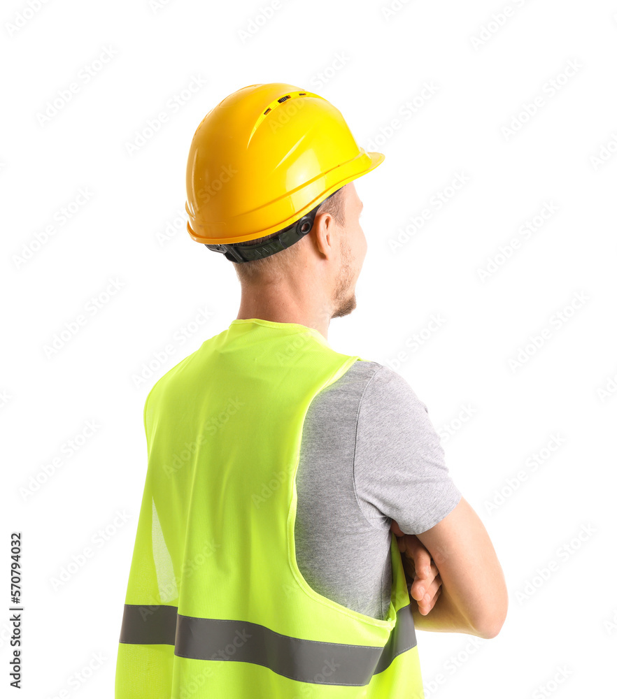 Male worker in vest and hardhat on white background