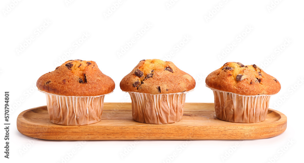 Board with delicious muffins isolated on white background